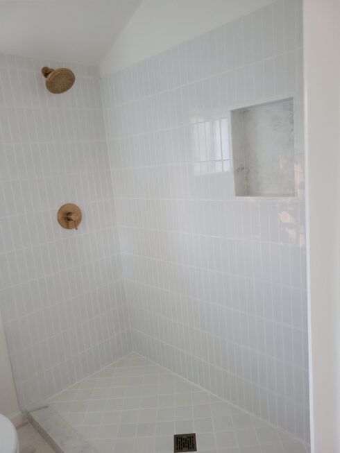White subway tile in bathroom installed with JLQ Construction in California